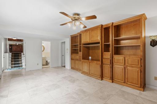 Family room with brick wood-burning fireplace