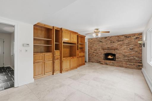 Family room with brick wood-burning fireplace