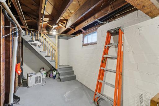 Stairs to lower level laundry & storage- unit 2