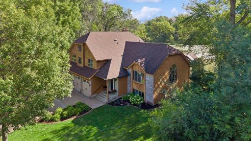 Spacious 5-bedroom, 4-bath Maplewood home with an impressive 4-car garage, located on a quiet cul-de-sac near Lake Gervais.