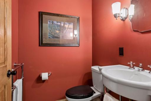Convenient main-level half bath located near the main living and entertaining spaces.