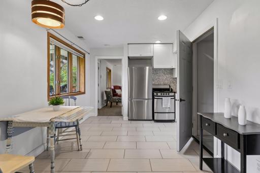 A second kitchen makes this lower-level suite especially functional, with dining space and easy access to the adjoining living and bedroom areas.