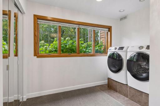 A second laundry area adds exceptional convenience and independence to the lower-level suite.