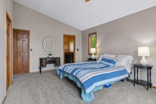 Another view of the generous primary suite with plenty of room to unwind and direct access to the private spa-like primary bath.