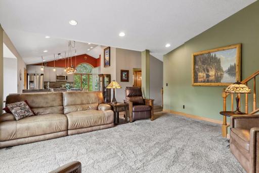 Open-concept living room flows into the dining area and kitchen, giving plenty of space for everyday living, entertaining and larger gatherings.