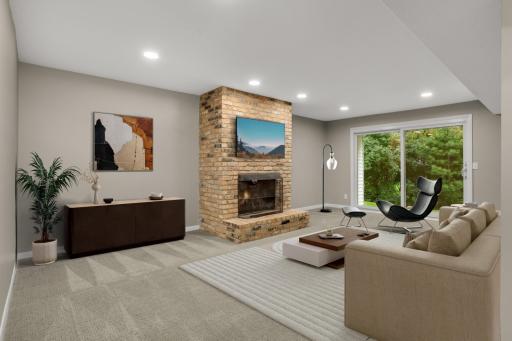 Lower level family room walks out to beautiful, private patio.