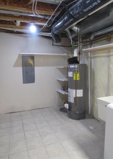 Extra storage in the utility room. Newer hot water heater, new water softener.