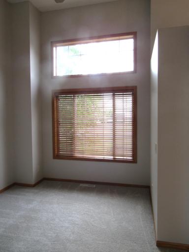 The front living room widows. All knock down ceilings and 6 panel doors throughout the home.