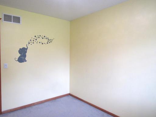 Upper level bedroom #2 has ceiling lighting, big double closet with 6 panel doors and nice blinds with a shelf above.