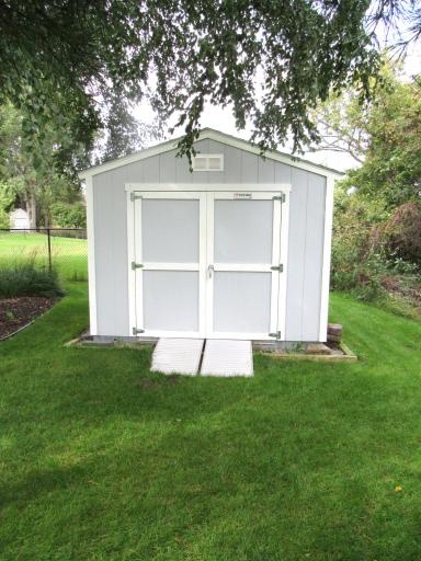 Great storage shed (2021) in the rear yard. There are garden areas in the back yard ready for veggie planting.