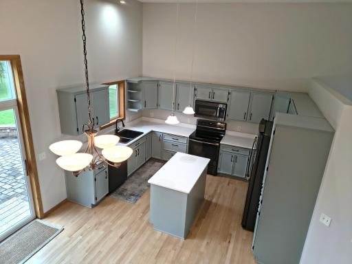 Updated soft close cabinets, new quartz counter tops, GE Profile black stainless steel appliances (fridge 2020, the rest 2022), refinished hardwood floors and fresh paint!