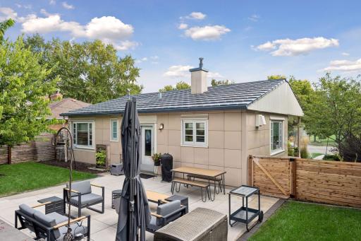 The backyard has been thoughtfully designed for outdoor dining, gathering, and everyday enjoyment.