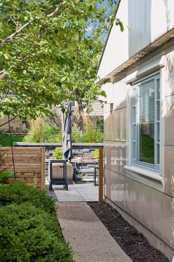 Easy access from the front of the house to the fully fenced backyard.