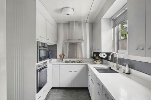 The renovated kitchen introduces modern function while respecting the homeâs architectural character.