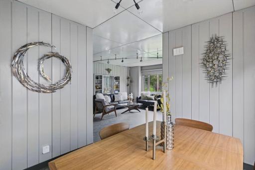 Original wall panels and streamlined detailing continue throughout the main living areas.