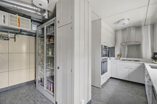 Thoughtful storage and efficient planning make the kitchen both practical and polished.