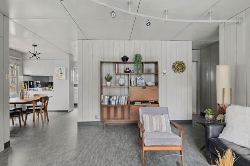 A comfortable living space framed by original steel walls and mid-century proportions.