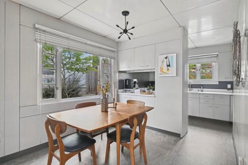The dining area sits conveniently between the living room and kitchen.