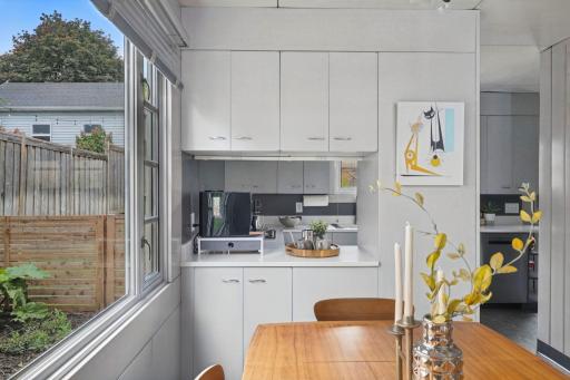 Natural light and simple lines give the dining area an easy, inviting feel.
