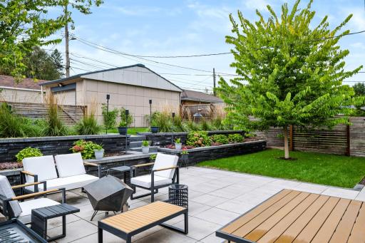 Garden beds add another layer of character to the outdoor spaces.