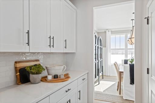 Butler's pantry between dining room and kitchen