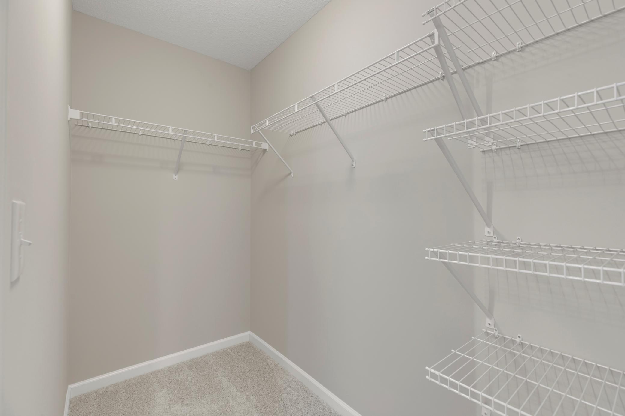 His and Her walk-in closets in Owner's Suite
