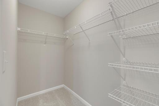His and Her walk-in closets in Owner's Suite