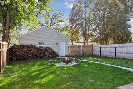 Spacious, fully fenced backyard with plenty of room to play, relax, and gather with family and friends.