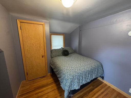Upper Level Bedroom Features Hardwood Floors