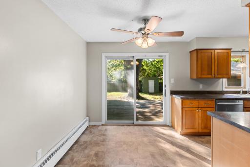 Dining room leading out to the deck and backyard.
