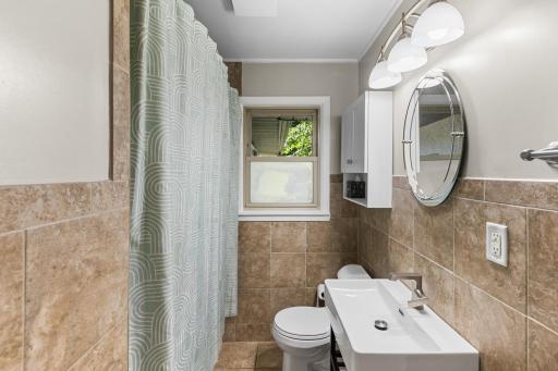 Main level full bathroom.