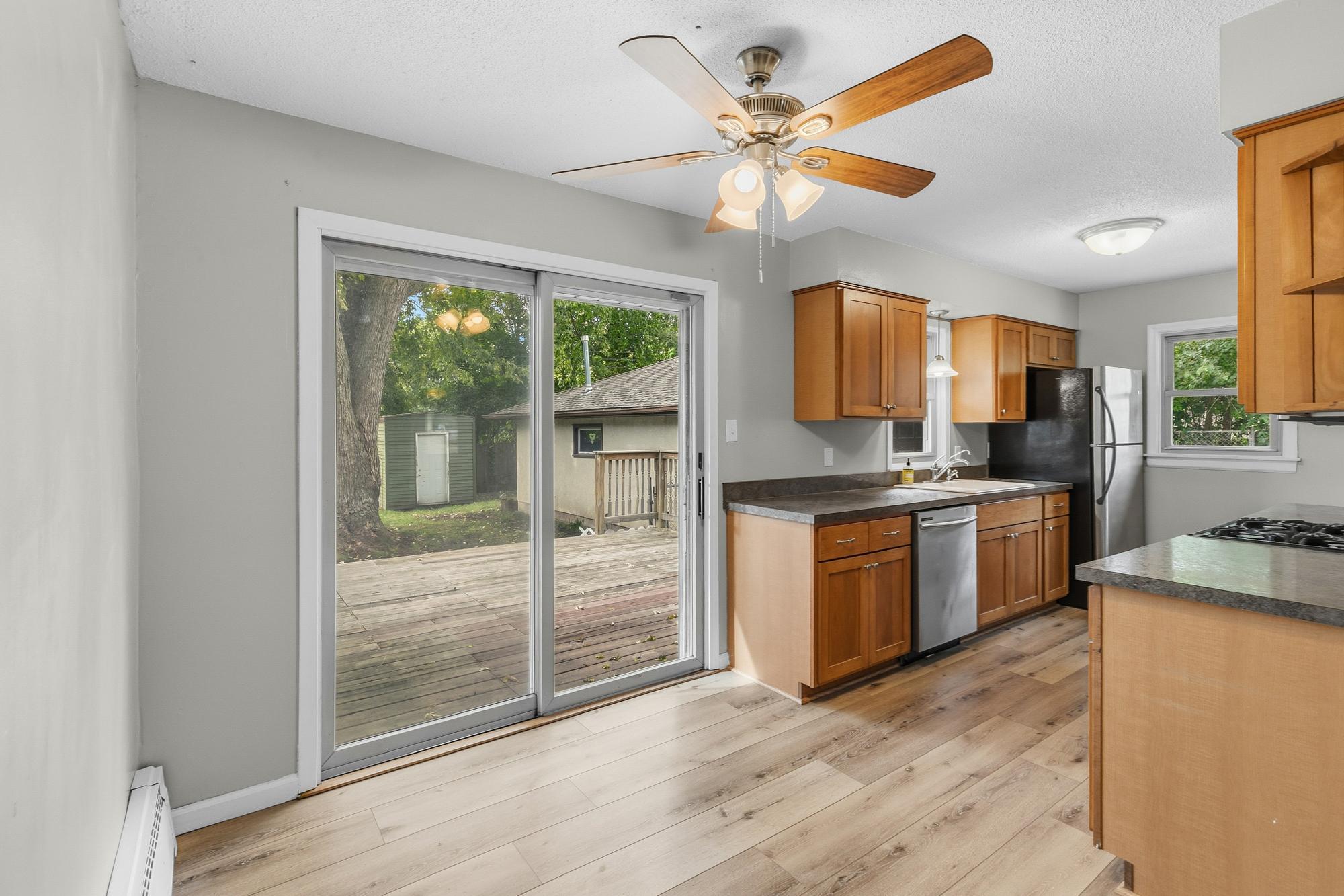 Oversized deck just a step away from kitchen/dining room.