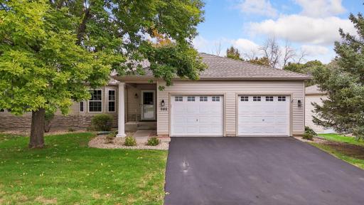 Welcome to 980 Carriage Lane, offering carefree townhome living, convenient one-level amenities, a newer roof, and a finished two-car garage.