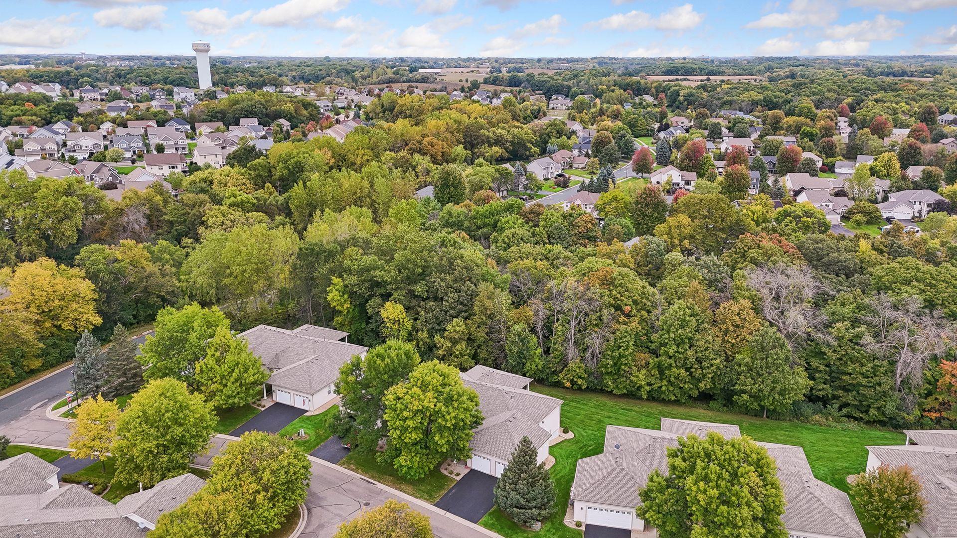 Enjoy a premium location with a wooded backdrop, generous open green space, and convenient access to Chaska’s parks and walking trails.
