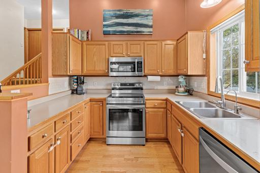 Large kitchen with plenty of counter space and cabinets.