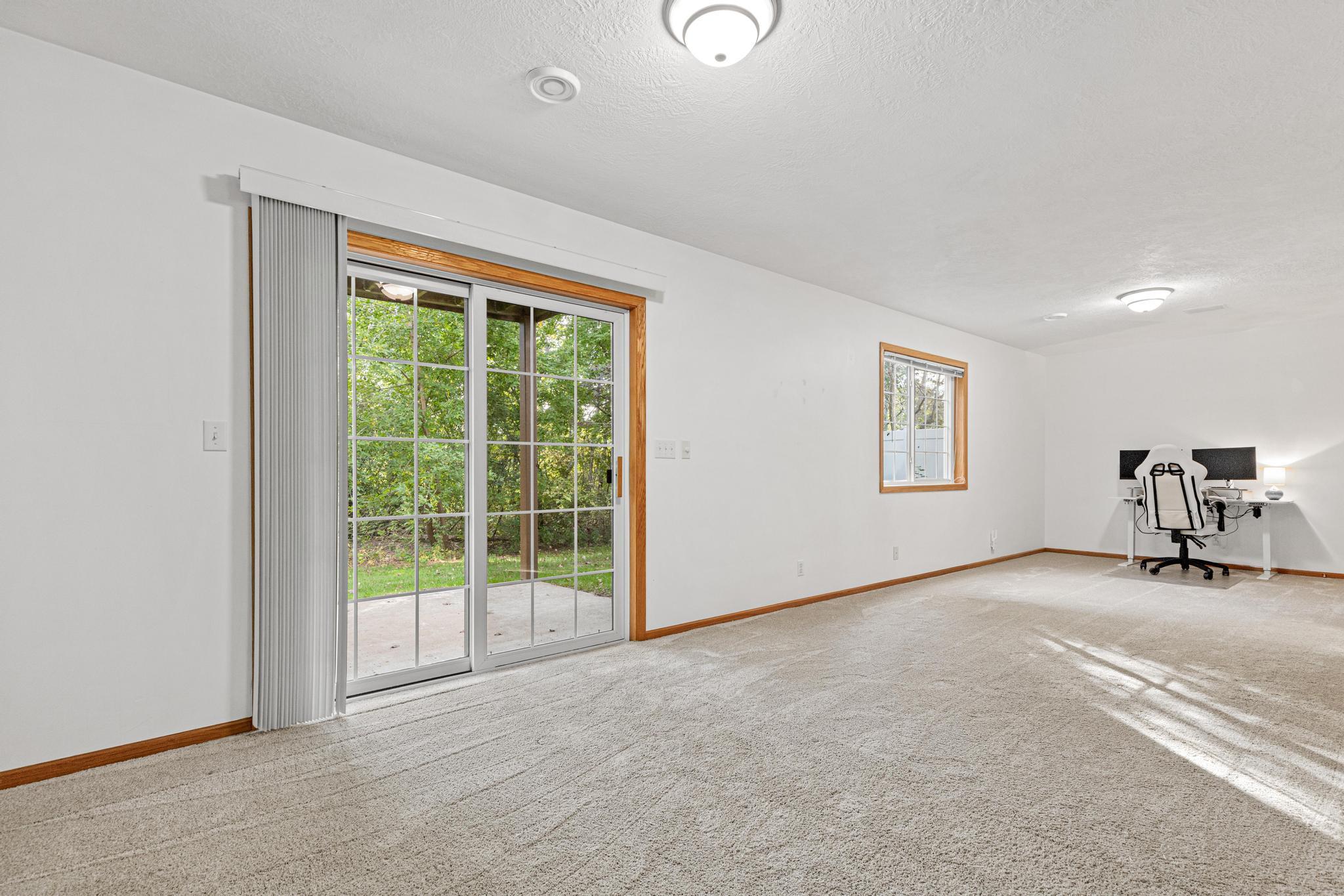 Lower level walk-out to your private backyard
