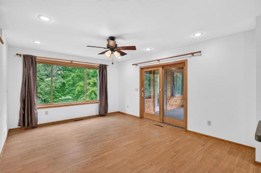 Direct access from the dining area makes the three-season porch an easy extension of the home.