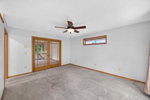 Double doors offer the option to easily separate the room when desired.