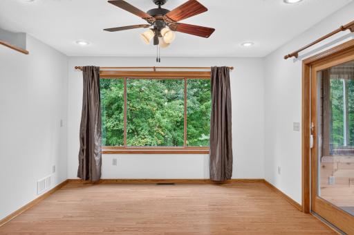 Large windows provide a beautiful backdrop for everyday dining.