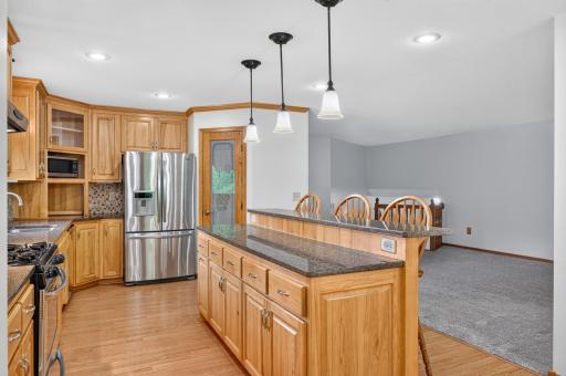 Generous cabinetry and pantry storage help keep everyday essentials organized.