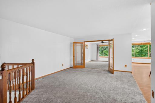 Bright upper level with neutral finishes and an easy flow.