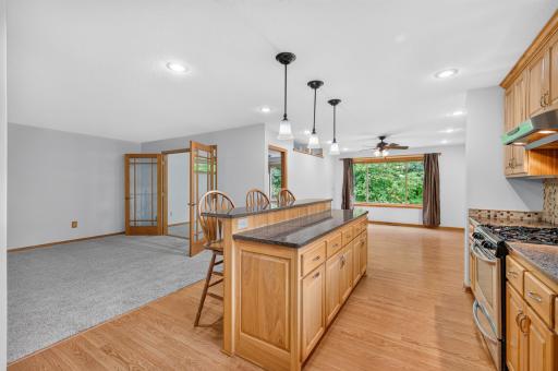 The center island adds valuable prep space, storage, and seating to the kitchen.