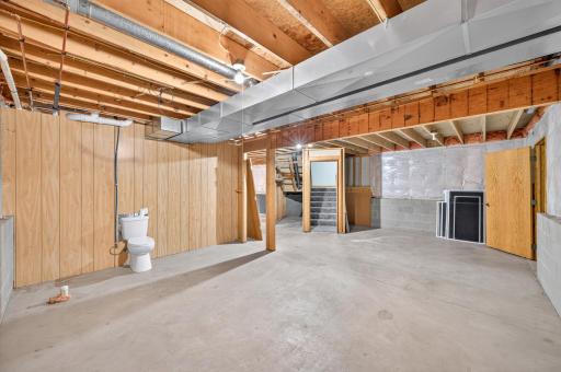 A wide-open unfinished space providing flexibility to customize over time.