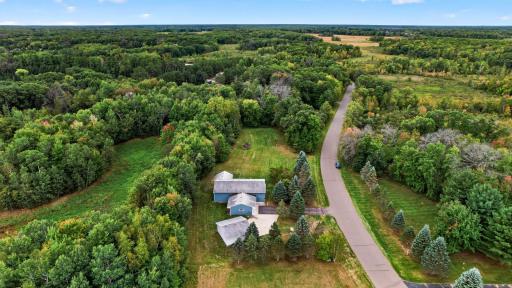 A private and peaceful location surrounded by mature trees and greenery.