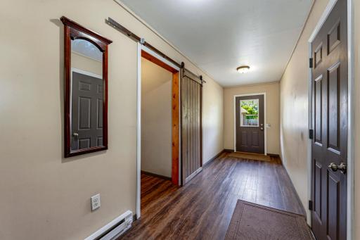The entryway connects the attached garage to the rest of the home.