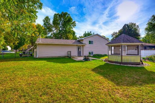 The fenced in backyard is the perfect place to relax, work, or entertain.