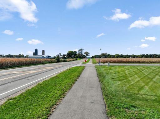 Community sidewalks connect to miles of walking paths