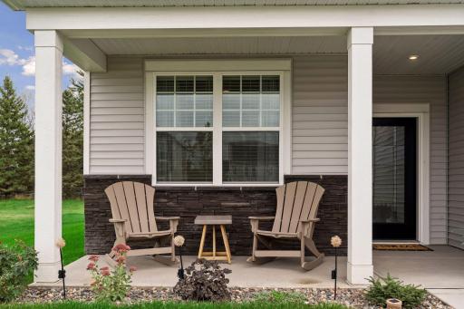 Relaxing and welcoming front porch overlooking cul-de-sac.