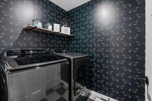 Upper level laundry room - upgraded with Samsung W/D, new floor tile and wallpaper.