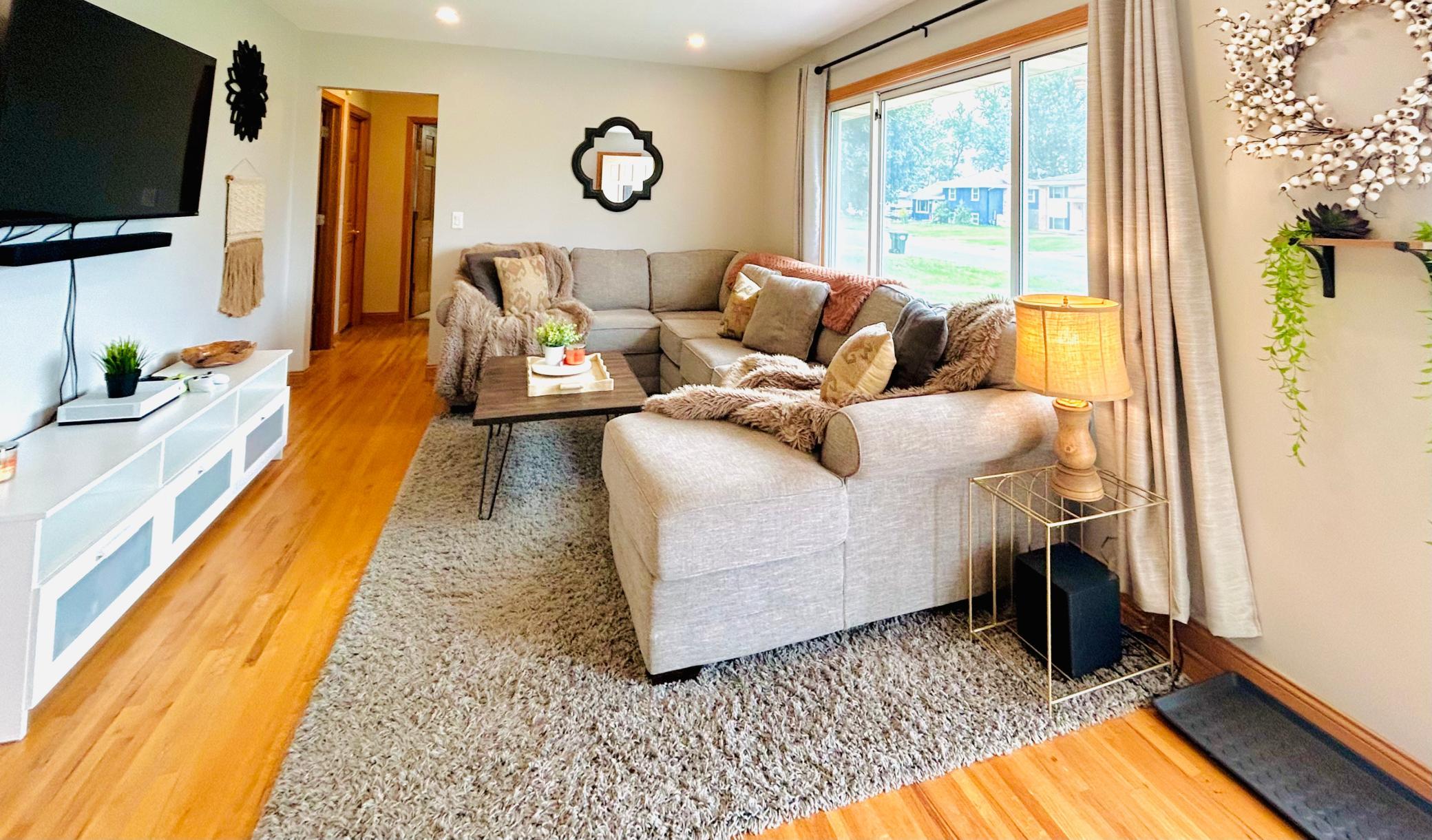 Tons of natural light and generous size living room..